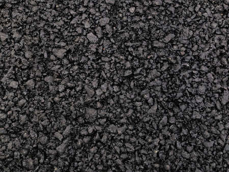 Dark asphalt surface background