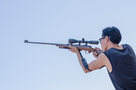 A shooter sighting in the target Long distance