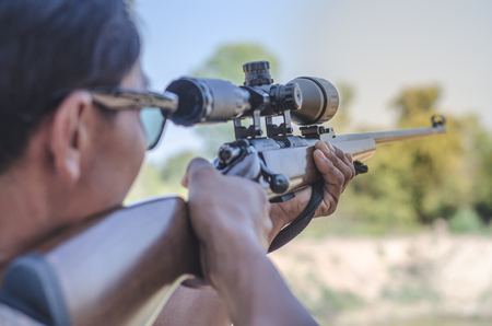 A shooter sighting in the target Long distance