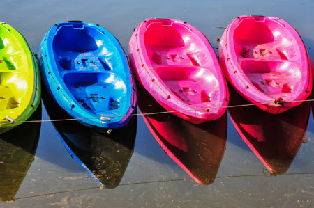 Kayaks in river Colorful plastic boat
