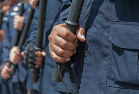 police Training in the use of batons to control crowds.の写真素材