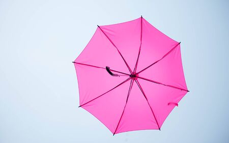 Streets are decorated with colorful umbrellas.の写真素材