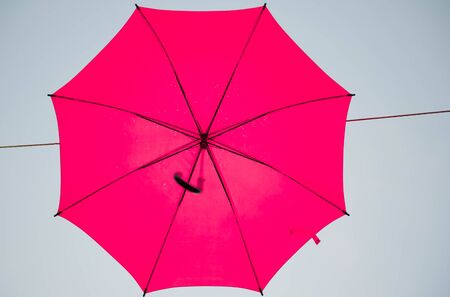 Streets are decorated with colorful umbrellas.の写真素材