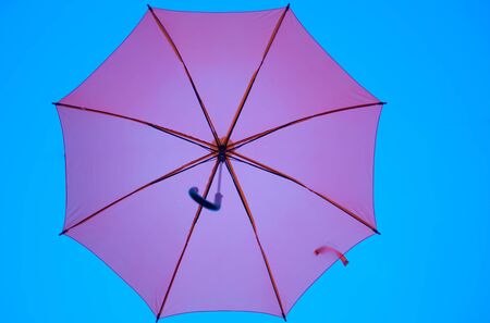 Streets are decorated with colorful umbrellas.の写真素材
