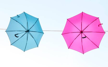 Streets are decorated with colorful umbrellas.の写真素材