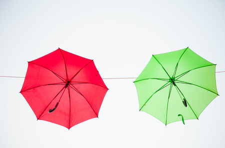 Streets are decorated with colorful umbrellas.の写真素材