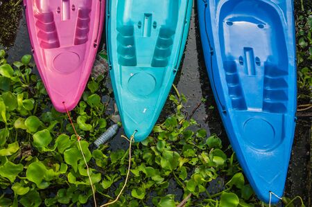 Kayaks in river Colorful plastic boat