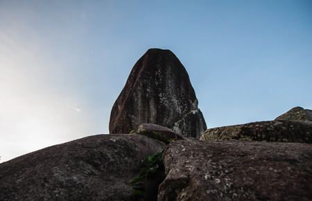 Blowing rock set on a cliffの写真素材