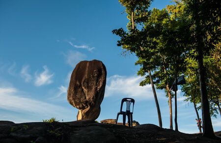 Blowing rock set on a cliffの写真素材