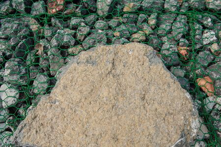 Wave erosion along embankments to prevent erosion.の写真素材