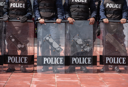 Riot police coaches review crowd controlの写真素材