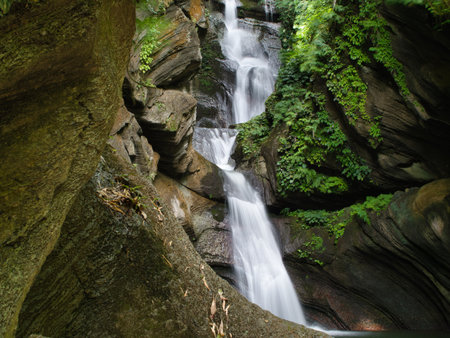 Waterfall in deep forest at Phu Soi Dao National Park, Thailandの写真素材