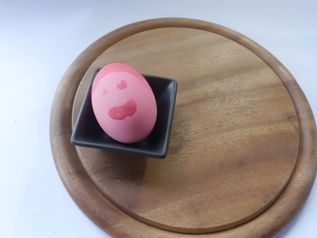 preserved egg on the cutting boardの写真素材