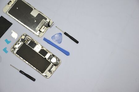 Soft focus to Tools for repairing smart phones on a white background - Change or replacement smart...