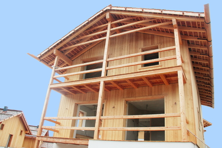 Wooden mountain style house under constructionのeditorial素材