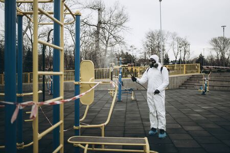 Cleaning and Disinfection on the playground in the sity complex amid the coronavirus epidemic...