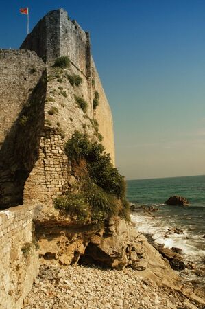  	The old fortress wall on the Adriatic coast. Montenegro, Budva.の写真素材