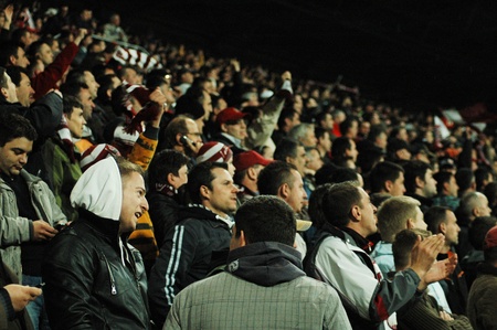 CLUJ NAPOCA, ROMANIA - APRIL 14: FC CFR Cluj team supporters show support during a game in League 1 against FC UNIVERSITATEA Cluj on April 14, 2011 in Cluj Napoca, Romania のeditorial素材