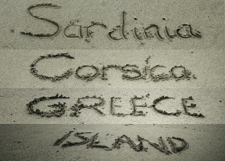 Different exotic destinations, letters on the sandの写真素材