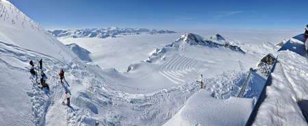 KITZSTEINHORN – CCA. MARCH: Panorama with unidentified skiers who are enjoying the last ski week...