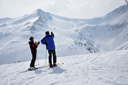 SAALBACH, CCA. MARCH: Panorama with unidentified skiers who are enjoying the last ski week of the...