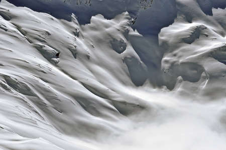 Sunny snow background in the Alpsの写真素材