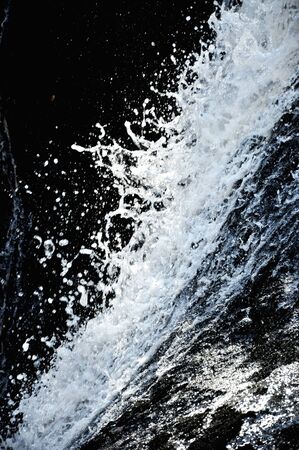 Water splash, cascade in the outdoorsの写真素材