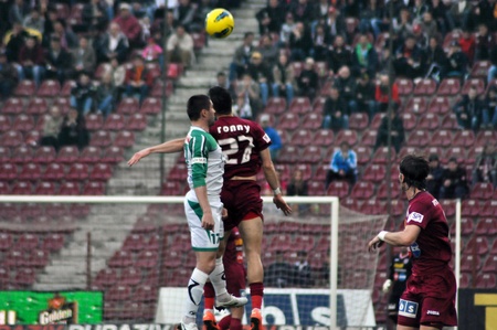 CLUJ-NAPOCA, ROMANIA â APRIL 22: Ronny C. (in red) in action at a Romanian National Championship soccer game CFR Cluj vs. C. Chiajna, April 22, 2012 in Cluj-Napoca, Romaniaのeditorial素材