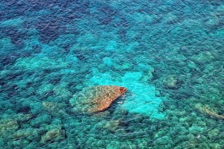 Beautiful clear, turquoise sea water, ideal for background の写真素材