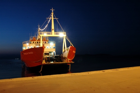 KERAMOTI - MARCH 25: Crowds of tourists came back with the ferry to continental Greece after they celebrated The Day of the Annunciation on March 25, 2009 in Thassos island, Greeceのeditorial素材