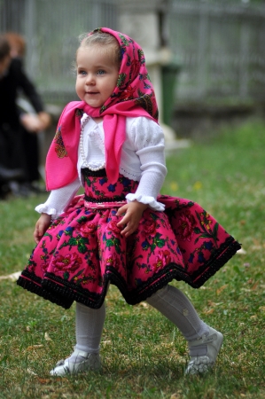 IEUD, ROMANIA - CCA. AUGUST, 2012: Celebration of a traditional Romanian wedding in traditional dresses at the Ieud Village Festival Days, at  August, 2012, in  Ieud, Maramures, Romaniaのeditorial素材