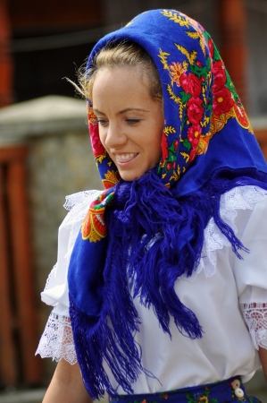 IEUD, ROMANIA - CCA. AUGUST, 2012: Celebration of a traditional Romanian wedding in traditional dresses at the Ieud Village Festival Days, at  August, 2012, in  Ieud, Maramures, Romania のeditorial素材