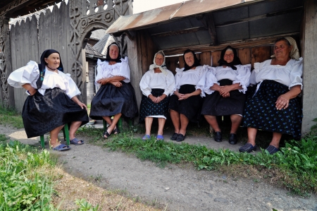 IEUD, ROMANIA - CCA. AUGUST, 2012: Celebration of a traditional Romanian wedding in traditional dresses at the Ieud Village Festival Days, at  August, 2012, in  Ieud, Maramures, Romania のeditorial素材