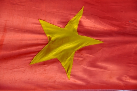 The flag of Vietnam, a yellow star on red backgroundの写真素材