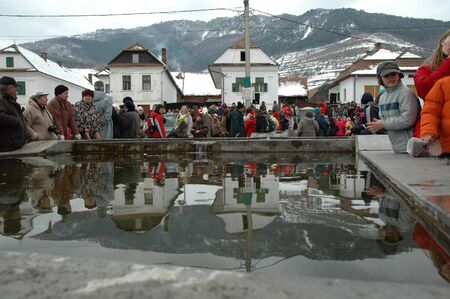 RIMETEA - FEB 28: Local unidentified villagers of Rimetea (Torocko) attending a unique show, the carnival with mask at the ending of winter. On February 28, 2009, in Rimetea, Romania.のeditorial素材