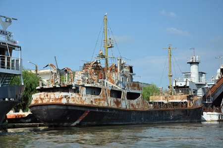 SULINA - JUNE 23: Old ship standing in Sulina port, one of the most important ports in Europe. After Paris Treaty in Sulina was established the Danube European Commission.On June 23 in Sulina, Romania のeditorial素材
