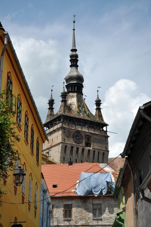 SIGHISOARA, ROMANIA  JUNE, 28: Tourists visiting Sighisoara (Schassburg, Segesvar), the only inhabited medieval citadel in Europe, part of UNESCO heritage. On June 28, 2013, in Sighisoara, Romaniaのeditorial素材