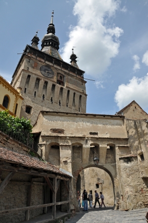 SIGHISOARA, ROMANIA  JUNE, 28: Tourists visiting Sighisoara (Schassburg, Segesvar), the only inhabited medieval citadel in Europe, part of UNESCO heritage. On June 28, 2013, in Sighisoara, Romaniaのeditorial素材