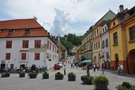 SIGHISOARA, ROMANIA  JUNE, 28: Tourists visiting Sighisoara (Schassburg, Segesvar), the only inhabited medieval citadel in Europe, part of UNESCO heritage. On June 28, 2013, in Sighisoara, Romaniaのeditorial素材