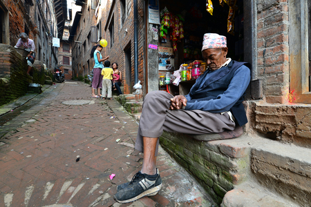 KATHMANDU - OCT 10  People of Kathmandu suburbs trying to survive in the daily life  They live in narrow streets in small apartments without water and electricity  On Oct 10, 2013 in Kathmandu, Nepal のeditorial素材