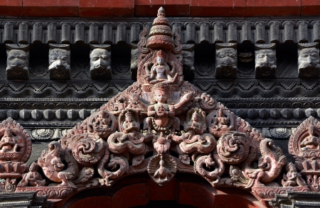 Carved wooden details on a Nepalese temple doorの写真素材