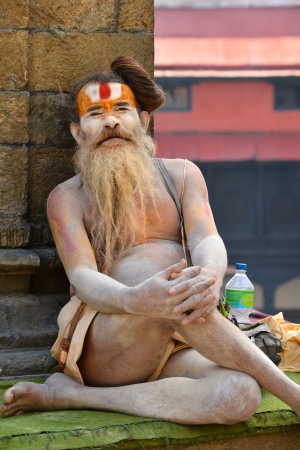 KATHMANDU - OCT 8  Sadhu at Pashupatinath in Kathmandu  Sadhus are holy men who have chosen to live an ascetic life and focus on the spiritual practice of Hinduism  On Oct 8, 2013 in Kathmandu, Nepalのeditorial素材