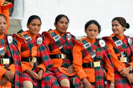 KATHMANDU - OCT 11  Musicians of the Nepalese Military Orchestra waiting for the show, in the inner courtyard of the Royal Palace, during the Dasain festival  On October 11, 2013 in Kathmandu, Nepalのeditorial素材