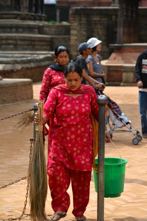 BHAKTAPUR, NEPAL - OCT 10  Women from Bhaktapur enjoying the holidays during the holy Hindu Dashain festival in the Durbar square  On October 10, 2013 in Kathmandu, Nepalのeditorial素材
