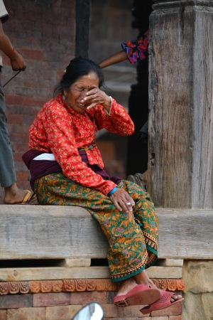 BHAKTAPUR, NEPAL - OCT 10  Women from Bhaktapur enjoying the holidays during the holy Hindu Dashain festival in the Durbar square  On October 10, 2013 in Kathmandu, Nepalのeditorial素材