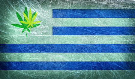 Grunge flag of Uruguay with a cannabis leaf  Uruguay becomes first country to legalize marijuana tradeの写真素材
