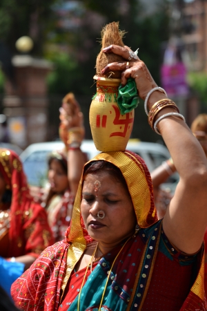 KATHMANDU, NEPAL - OCTOBER 11  Crowd of Hindu people celebrating the first day of the Dasain festival on the streets of Kathmandu  On October 11, 2013 in Kathmandu, Nepal のeditorial素材