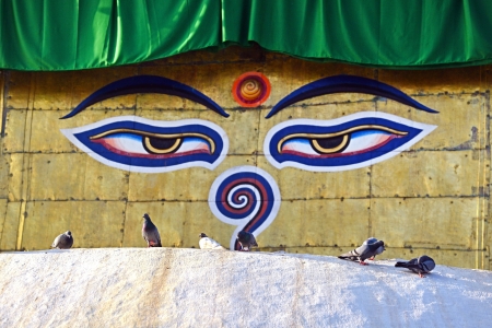 Eyes of Buddha painted on the Swayambhunath stupa, Nepal  Focus on foreground