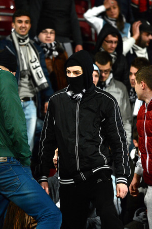 CLUJ - MARCH 4  Ultras hooligans of the U Cluj soccer club supporting their team against CFR Cluj ...