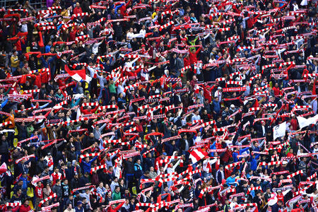 BUCHAREST - APRIL 17  Crowd of soccer fans of Dinamo Bucharest during a match against Steaua Bucharest, in the National Arena stadium, final score  1-1  On April 17, 2014 in Bucharest, Romania のeditorial素材